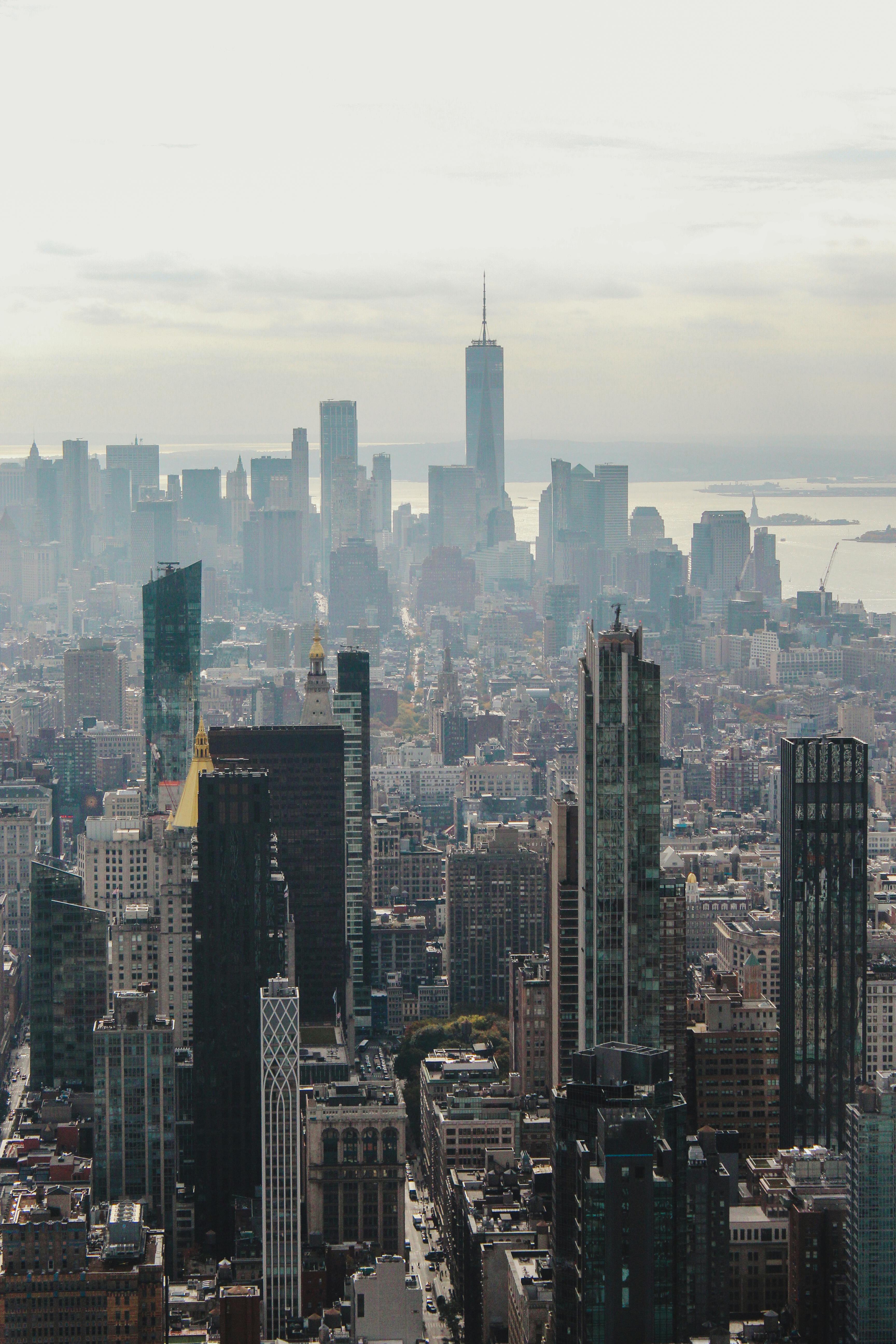 City skyline at dusk, representing growth and expanded opportunity.